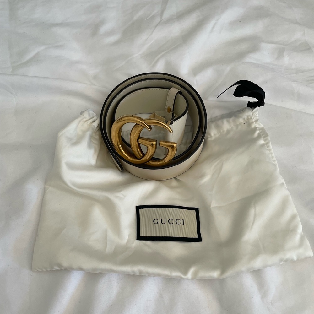 Women’s white Gucci belt